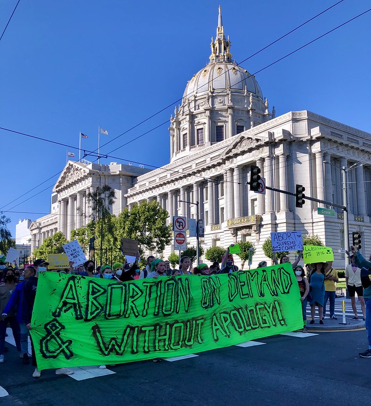 Thousands gathered in civic engagement to vocalize opposition to the current Supreme Court decision to Roe. v. Wade in San Francisco, on Friday, June 24, 2022. Here, citizens, carrying a bright green sign chant, "rise up for abortion rights; abortion rights, rise up, rise up."